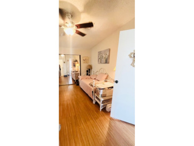 This charming two-bedroom, two-bathroom home is nestled in a on Pine Lakes Country Club in Florida - for sale on GolfHomes.com, golf home, golf lot