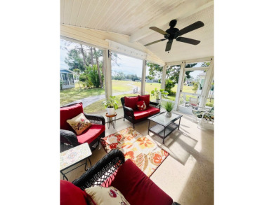 This charming two-bedroom, two-bathroom home is nestled in a on Pine Lakes Country Club in Florida - for sale on GolfHomes.com, golf home, golf lot