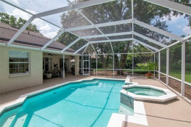 Welcome to this charming three-bedroom, two-bathroom home on River Hills Country Club in Florida - for sale on GolfHomes.com, golf home, golf lot