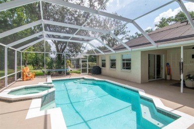 Welcome to this charming three-bedroom, two-bathroom home on River Hills Country Club in Florida - for sale on GolfHomes.com, golf home, golf lot