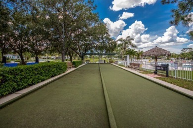 This charming two-bedroom, two-bathroom home is nestled in a on Pine Lakes Country Club in Florida - for sale on GolfHomes.com, golf home, golf lot