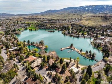 Nestled behind the guarded gates of the highly sought-after on LakeRidge Golf Course in Nevada - for sale on GolfHomes.com, golf home, golf lot