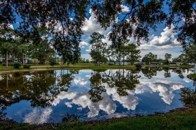 This charming two-bedroom, two-bathroom home is nestled in a on Pine Lakes Country Club in Florida - for sale on GolfHomes.com, golf home, golf lot