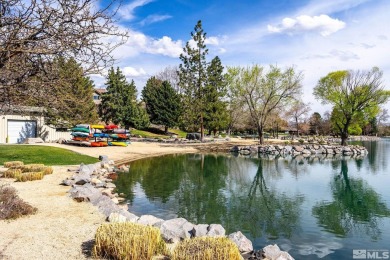 Nestled behind the guarded gates of the highly sought-after on LakeRidge Golf Course in Nevada - for sale on GolfHomes.com, golf home, golf lot