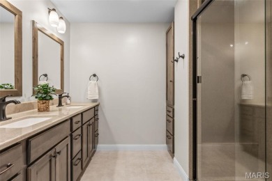 Enjoy stunning sunset lake views from this charming all-brick on Terre Du Lac Golf and Country Club in Missouri - for sale on GolfHomes.com, golf home, golf lot