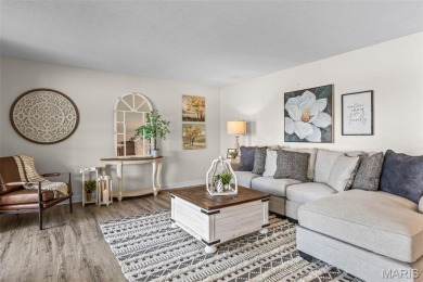Enjoy stunning sunset lake views from this charming all-brick on Terre Du Lac Golf and Country Club in Missouri - for sale on GolfHomes.com, golf home, golf lot