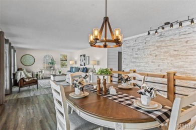 Enjoy stunning sunset lake views from this charming all-brick on Terre Du Lac Golf and Country Club in Missouri - for sale on GolfHomes.com, golf home, golf lot