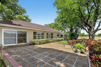 Discover this beautiful & rare VILLA nestled on a QUIET on Palm-Aire Country Club and Resort - Palms in Florida - for sale on GolfHomes.com, golf home, golf lot