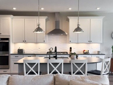 Why wait to build when you can own a nearly-new 2022 home that's on Triple Crown Country Club in Kentucky - for sale on GolfHomes.com, golf home, golf lot