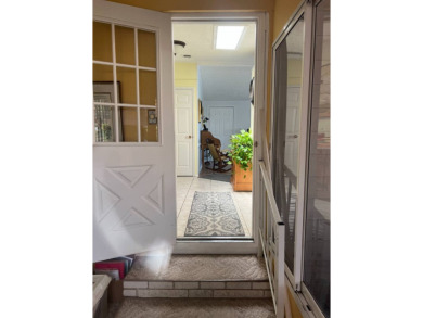 2 Bedroom | 2 Bath | 1,152 sq ft | $57,900    This on Lake Henry Golf Club in Florida - for sale on GolfHomes.com, golf home, golf lot