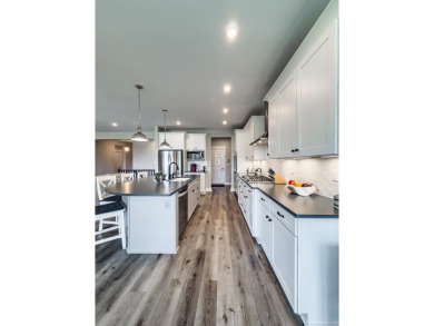 Why wait to build when you can own a nearly-new 2022 home that's on Triple Crown Country Club in Kentucky - for sale on GolfHomes.com, golf home, golf lot