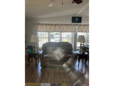 2 Bedroom | 2 Bath | 1,152 sq ft | $57,900    This on Lake Henry Golf Club in Florida - for sale on GolfHomes.com, golf home, golf lot