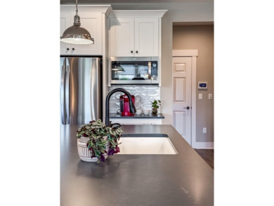 Why wait to build when you can own a nearly-new 2022 home that's on Triple Crown Country Club in Kentucky - for sale on GolfHomes.com, golf home, golf lot