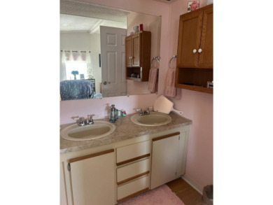 2 Bedroom | 2 Bath | 1,152 sq ft | $57,900    This on Lake Henry Golf Club in Florida - for sale on GolfHomes.com, golf home, golf lot
