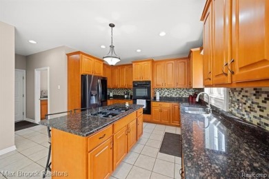 Welcome to this stunning colonial brick home in the highly on The Orchards Golf Club in Michigan - for sale on GolfHomes.com, golf home, golf lot
