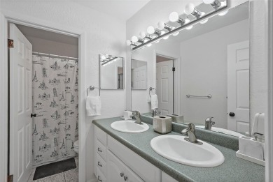 Nestled within the serene waterfront Mariners Pass community on Mangrove Bay Golf Course in Florida - for sale on GolfHomes.com, golf home, golf lot