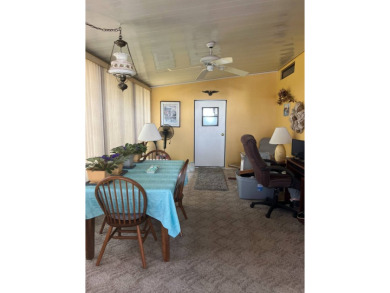2 Bedroom | 2 Bath | 1,152 sq ft | $57,900    This on Lake Henry Golf Club in Florida - for sale on GolfHomes.com, golf home, golf lot