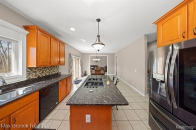 Welcome to this stunning colonial brick home in the highly on The Orchards Golf Club in Michigan - for sale on GolfHomes.com, golf home, golf lot