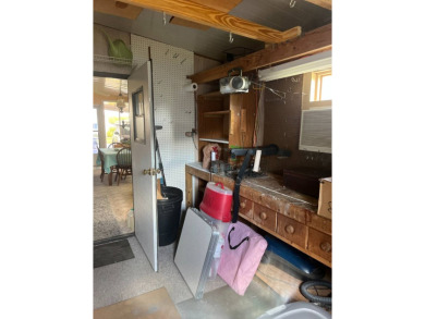 2 Bedroom | 2 Bath | 1,152 sq ft | $57,900    This on Lake Henry Golf Club in Florida - for sale on GolfHomes.com, golf home, golf lot