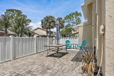 Nestled within the serene waterfront Mariners Pass community on Mangrove Bay Golf Course in Florida - for sale on GolfHomes.com, golf home, golf lot