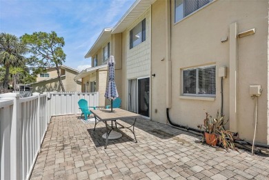 Nestled within the serene waterfront Mariners Pass community on Mangrove Bay Golf Course in Florida - for sale on GolfHomes.com, golf home, golf lot