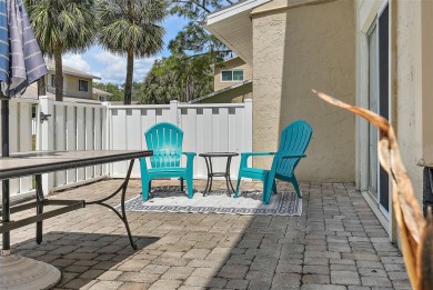 Nestled within the serene waterfront Mariners Pass community on Mangrove Bay Golf Course in Florida - for sale on GolfHomes.com, golf home, golf lot