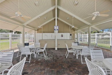 Nestled within the serene waterfront Mariners Pass community on Mangrove Bay Golf Course in Florida - for sale on GolfHomes.com, golf home, golf lot