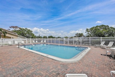 Nestled within the serene waterfront Mariners Pass community on Mangrove Bay Golf Course in Florida - for sale on GolfHomes.com, golf home, golf lot
