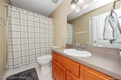 Welcome to this stunning colonial brick home in the highly on The Orchards Golf Club in Michigan - for sale on GolfHomes.com, golf home, golf lot