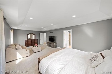 Welcome to this stunning colonial brick home in the highly on The Orchards Golf Club in Michigan - for sale on GolfHomes.com, golf home, golf lot