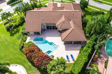 Experience the charm of this exquisite home, set on a stunning on Bocaire Country Club in Florida - for sale on GolfHomes.com, golf home, golf lot