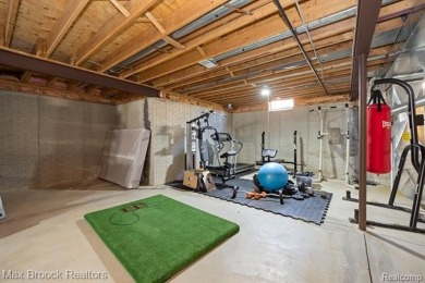 Welcome to this stunning colonial brick home in the highly on The Orchards Golf Club in Michigan - for sale on GolfHomes.com, golf home, golf lot
