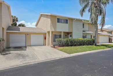 Nestled within the serene waterfront Mariners Pass community on Mangrove Bay Golf Course in Florida - for sale on GolfHomes.com, golf home, golf lot