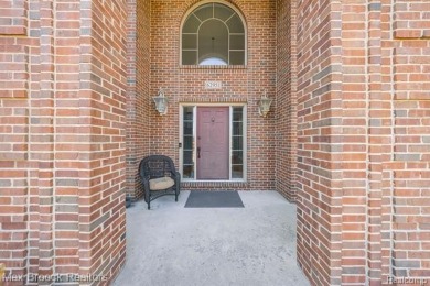 Welcome to this stunning colonial brick home in the highly on The Orchards Golf Club in Michigan - for sale on GolfHomes.com, golf home, golf lot