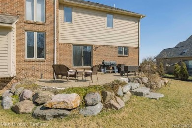 Welcome to this stunning colonial brick home in the highly on The Orchards Golf Club in Michigan - for sale on GolfHomes.com, golf home, golf lot