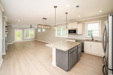 Welcome to this beautiful 2-bedroom, 2-bathroom home located in on Myrtlewood Golf Course and Club  in South Carolina - for sale on GolfHomes.com, golf home, golf lot