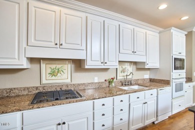 Stately all-brick end-unit townhome nestled in Westshore Park on Highland Country Club in North Carolina - for sale on GolfHomes.com, golf home, golf lot