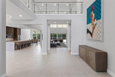 Step into this exquisitely renovated home, where modern design on Polo Club of Boca Raton in Florida - for sale on GolfHomes.com, golf home, golf lot