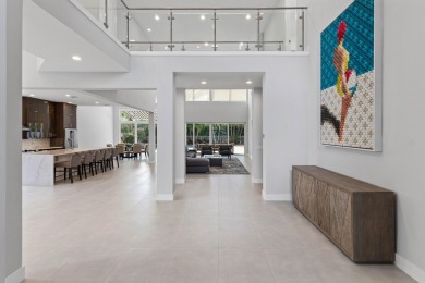 Step into this exquisitely renovated home, where modern design on Polo Club of Boca Raton in Florida - for sale on GolfHomes.com, golf home, golf lot