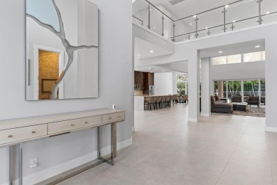 Step into this exquisitely renovated home, where modern design on Polo Club of Boca Raton in Florida - for sale on GolfHomes.com, golf home, golf lot