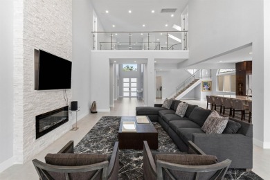 Step into this exquisitely renovated home, where modern design on Polo Club of Boca Raton in Florida - for sale on GolfHomes.com, golf home, golf lot