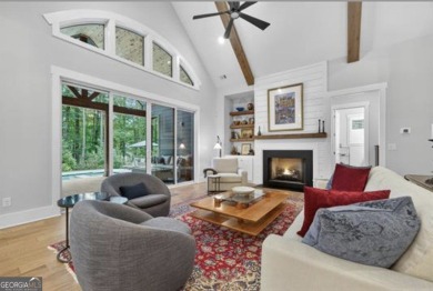 Experience elegance and privacy in this immaculate 4-bedroom, 3 on Harbor Club Golf and Country Club in Georgia - for sale on GolfHomes.com, golf home, golf lot