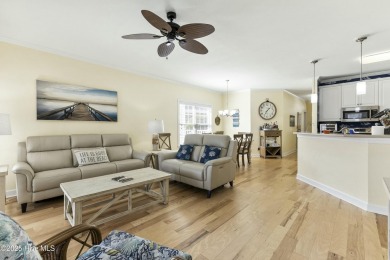 A stunning first floor condo in the Osprey Creek section of Sea on Sea Trail Golf Resort in North Carolina - for sale on GolfHomes.com, golf home, golf lot