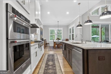 Experience elegance and privacy in this immaculate 4-bedroom, 3 on Harbor Club Golf and Country Club in Georgia - for sale on GolfHomes.com, golf home, golf lot