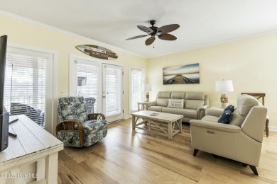 A stunning first floor condo in the Osprey Creek section of Sea on Sea Trail Golf Resort in North Carolina - for sale on GolfHomes.com, golf home, golf lot