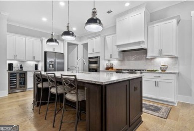 Experience elegance and privacy in this immaculate 4-bedroom, 3 on Harbor Club Golf and Country Club in Georgia - for sale on GolfHomes.com, golf home, golf lot