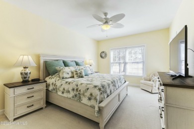 A stunning first floor condo in the Osprey Creek section of Sea on Sea Trail Golf Resort in North Carolina - for sale on GolfHomes.com, golf home, golf lot