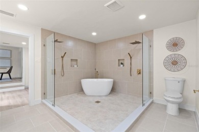 Under contract-accepting backup offers. Lakeview home in on The Dunedin Country Club in Florida - for sale on GolfHomes.com, golf home, golf lot