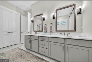 Experience elegance and privacy in this immaculate 4-bedroom, 3 on Harbor Club Golf and Country Club in Georgia - for sale on GolfHomes.com, golf home, golf lot