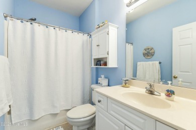 A stunning first floor condo in the Osprey Creek section of Sea on Sea Trail Golf Resort in North Carolina - for sale on GolfHomes.com, golf home, golf lot